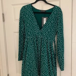 Green polka dot wrap dress